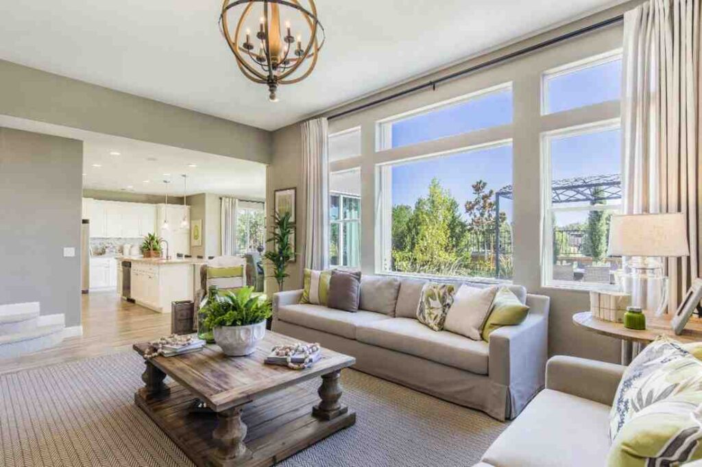 open plan living room with kitchen and natural light interior design